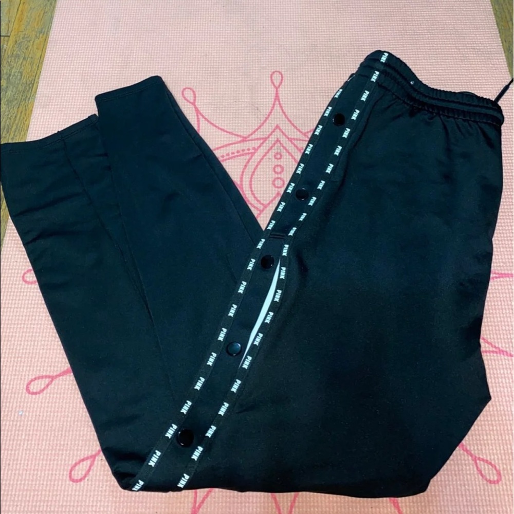 Pink track pants